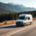 Mercedes-Benz Sprinter Van traveling on highway through forest and mountain in the backgro