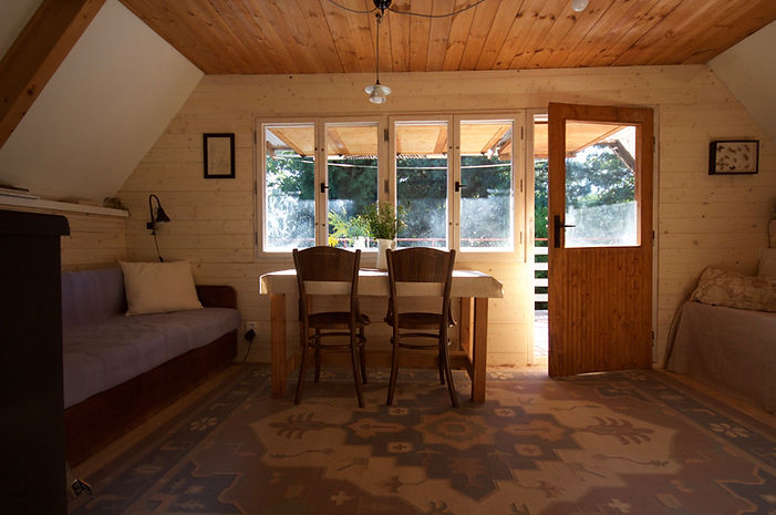 hygge RabunaDesign interior design Prague wooden summer house cottage living room cabin Czech