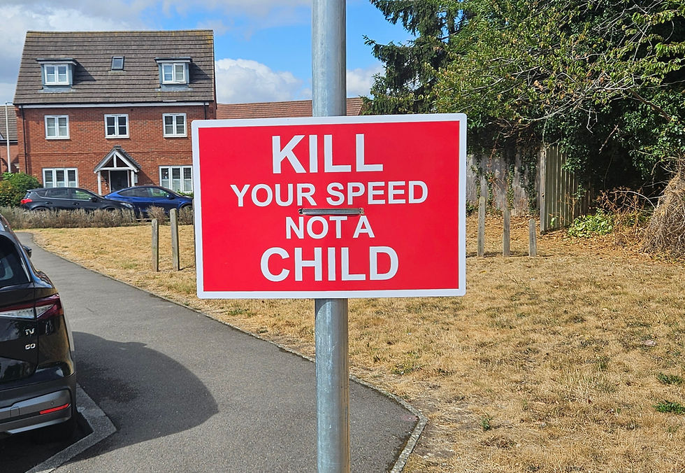 Shinfield Meadows resident installs sign on Bolton Drive