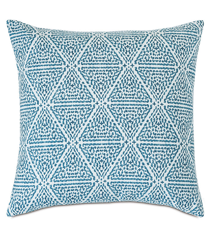 navy blue and white throw pillow with geometric design