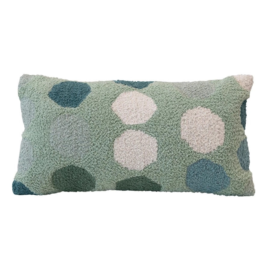 lumbar pillow with mint green background and dark green dots