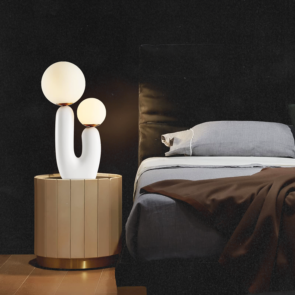 White lamp base with globe shades next to bedside