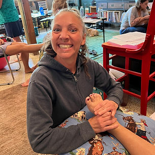 Student practicing massage therapy techniques