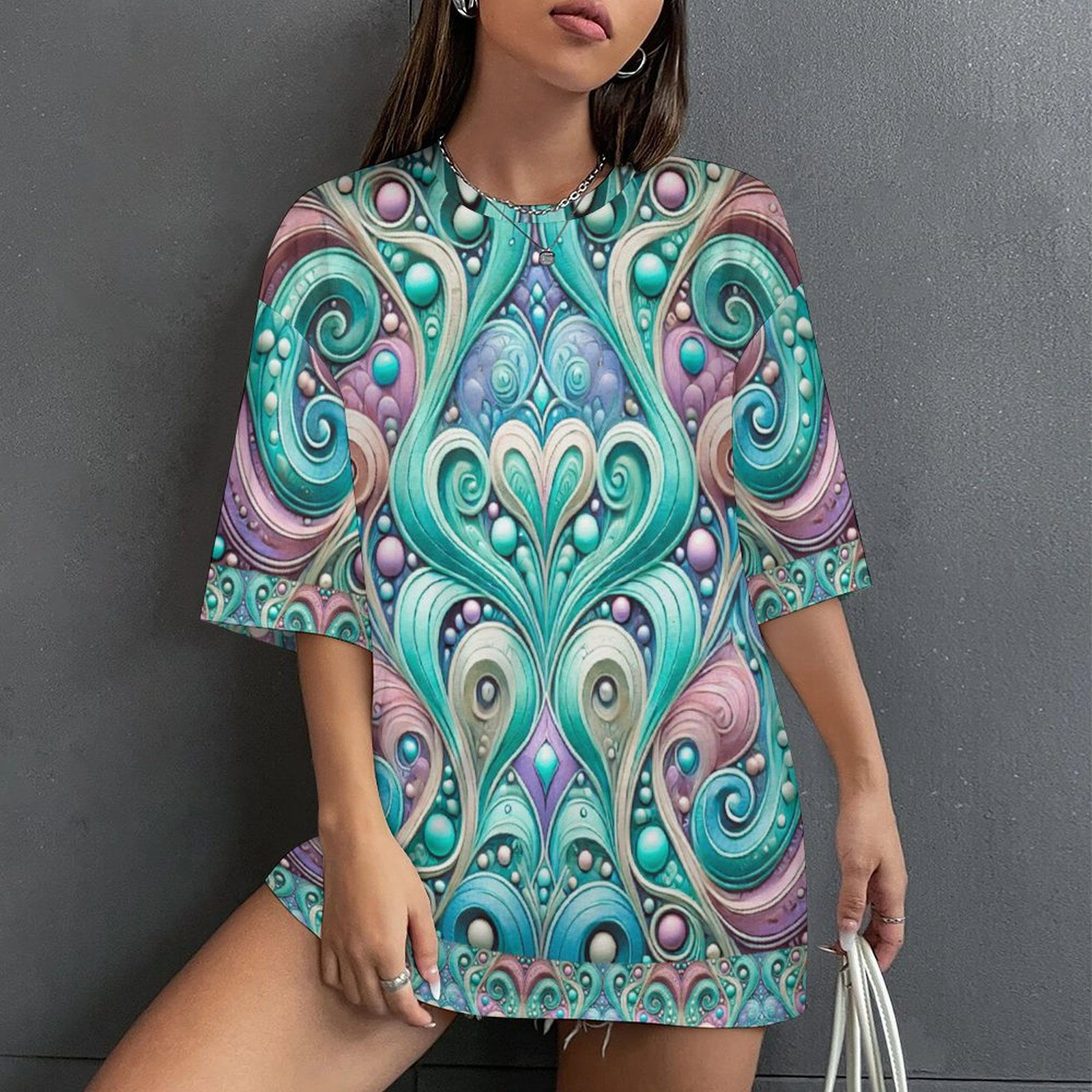 Model wearing Precious Heart Women's Drop-Shoulder Mid-Sleeve T-Shirt in pastel pink purple and turquoise