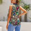Thumbnail: Model wearing Jewelscape - Women's Sleeveless Top with built in mulberry necktie