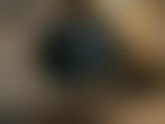 Black Halo JuGs™ trucker hat featuring the official A Lifestyle Flex™ trademark patch, displayed in a modern luxury home setting.