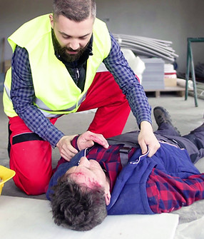 accident-of-a-male-worker-at-the-construction-site-a-man-helping-his-colleague-lying-u-SBI