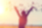 silhouette-woman-rising-hands-sunset-sky-flying-birds.jpg