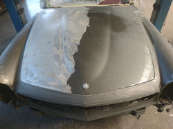 Entlacken einer Motrohaube