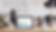 A laptop with a Dynamics 365 Business Central dashboard on the screen surrounded by black and beige decor