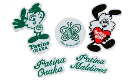 Cartoon characters holding hearts and a butterfly logo, with text: Patina Osaka and Patina Maldives. Green and black on white background.