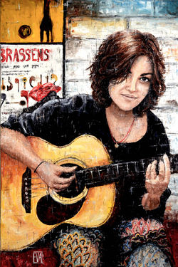 Le regard de la guitariste