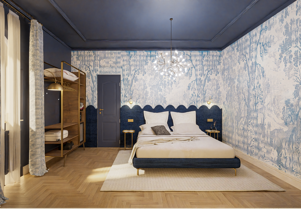 Camera matrimoniale di boutique hotel in stile Liberty con carta da parati decorativa, testata su misura e atmosfera raffinata.