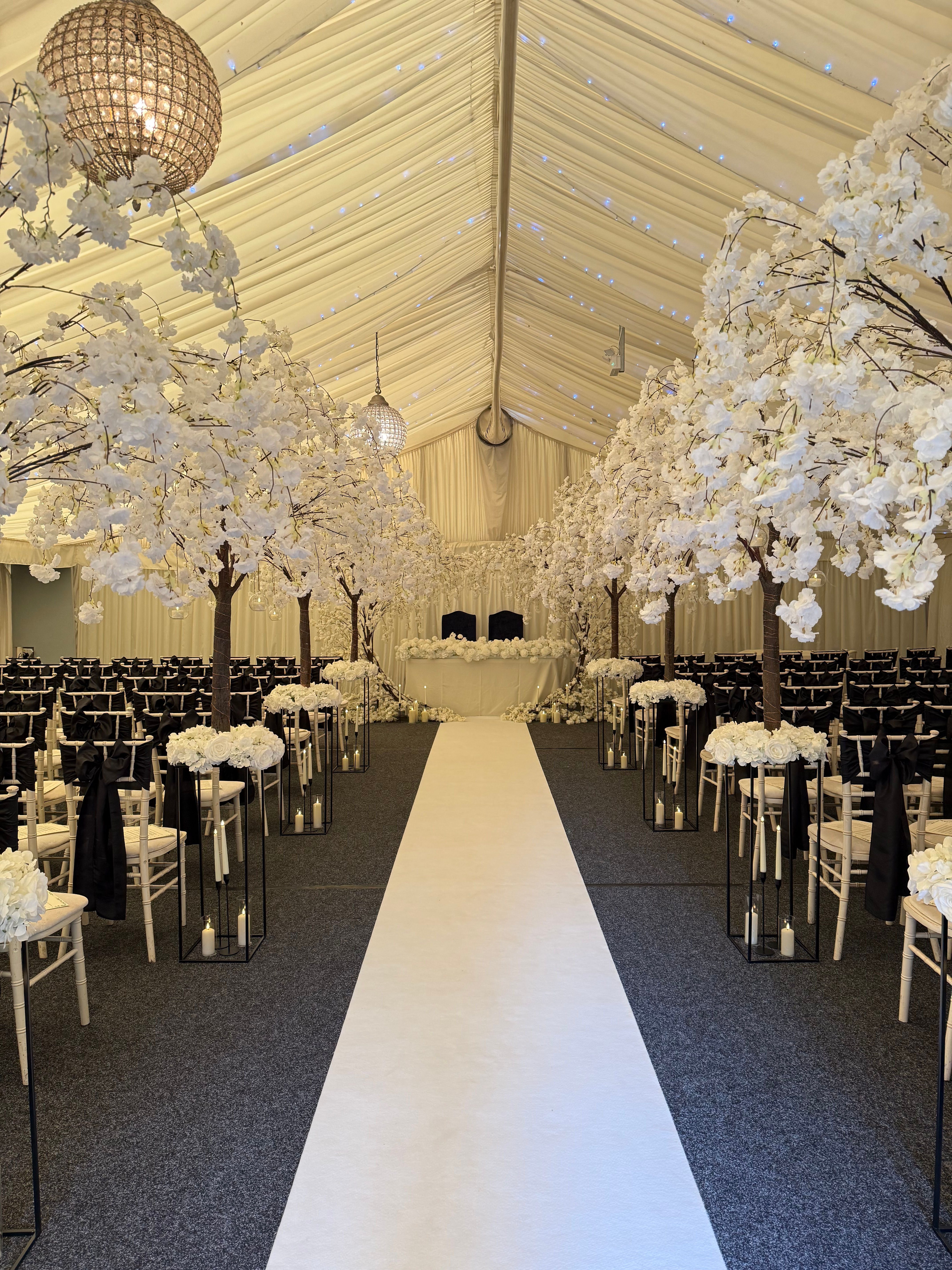 Tree lined aisle with matching arch