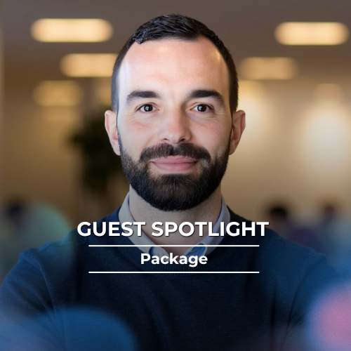 Podcast host interviewing a business leader in a professional studio setting.