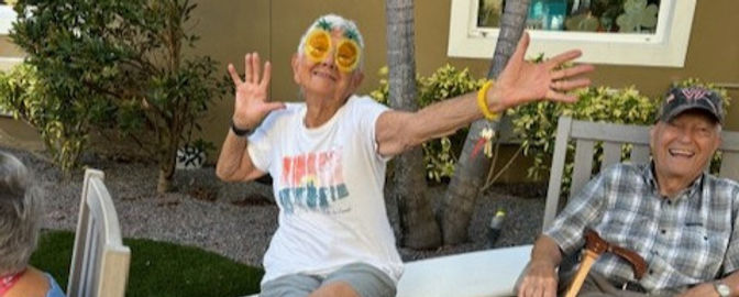 Smiling Residents in the Courtyard During Spirit Week