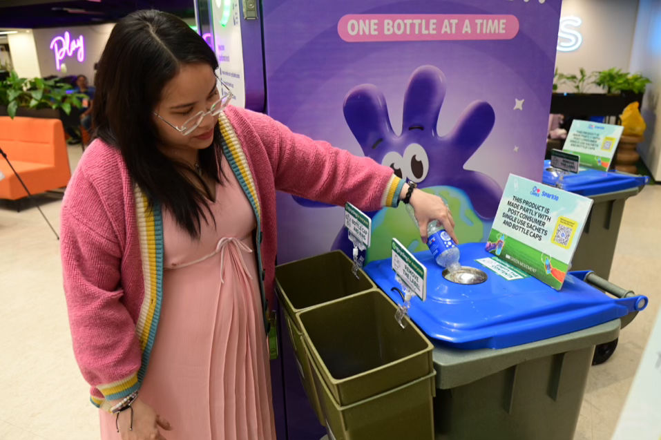 A recycled‑plastic bin demonstrates how discarded bottles can be transformed into useful community assets—turning waste into purpose and supporting more sustainable habits for all