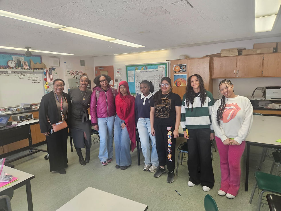 Head Coach, Amber Lee Forrester, with students and staff at George Washington Carver HS in Queens, NY
