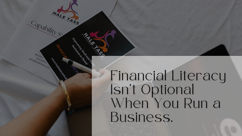 Small business owner reviewing finances and cash flow on laptop at desk