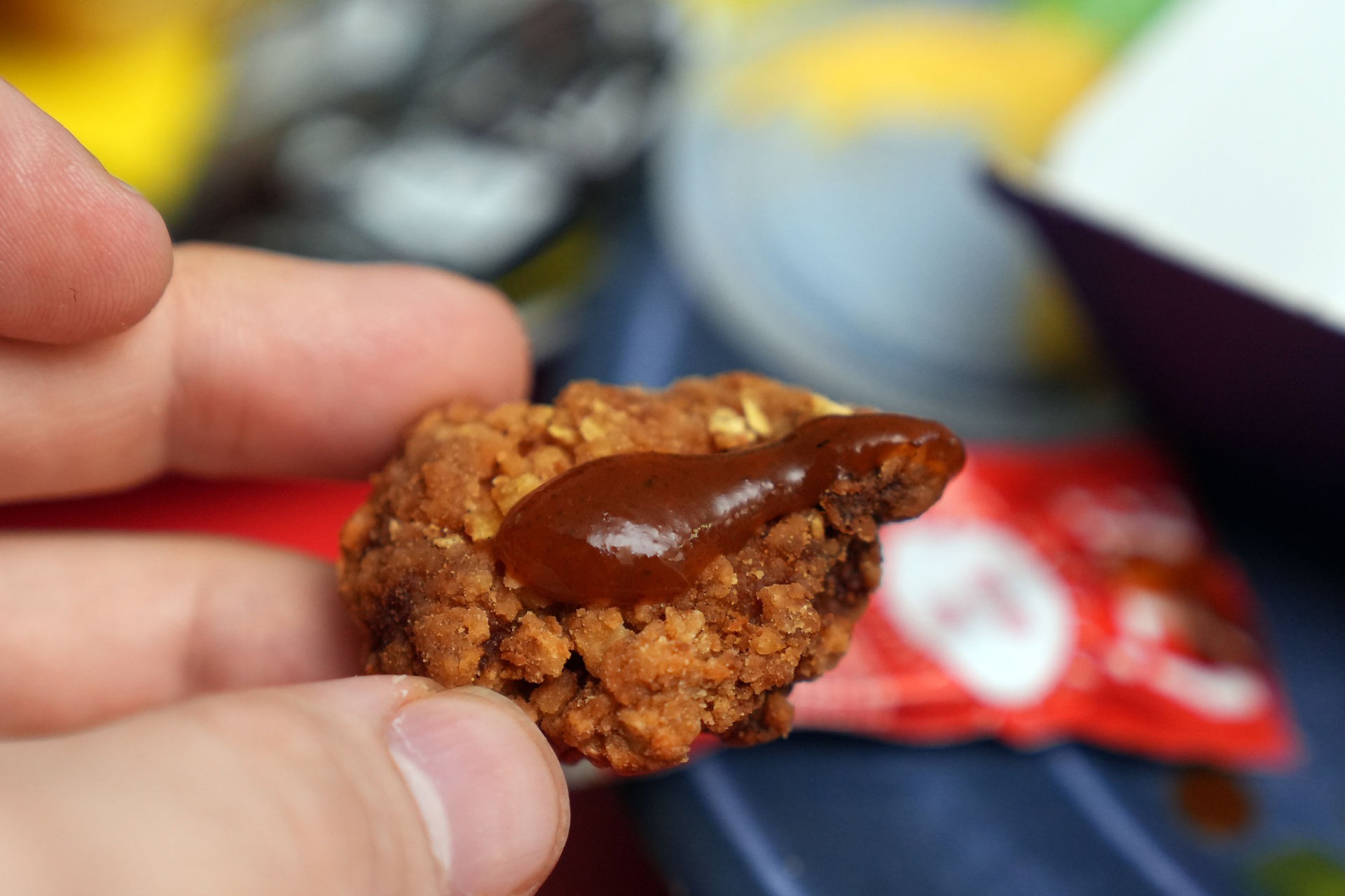 dark red taco sauce on a nugget