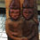 Thumbnail: Intricate wood carving of two figures