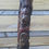 Thumbnail: Hand-carved wooden totem pole depicting Native American figures and bear