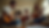 Eye-level view of a family playing musical instruments together in a living room