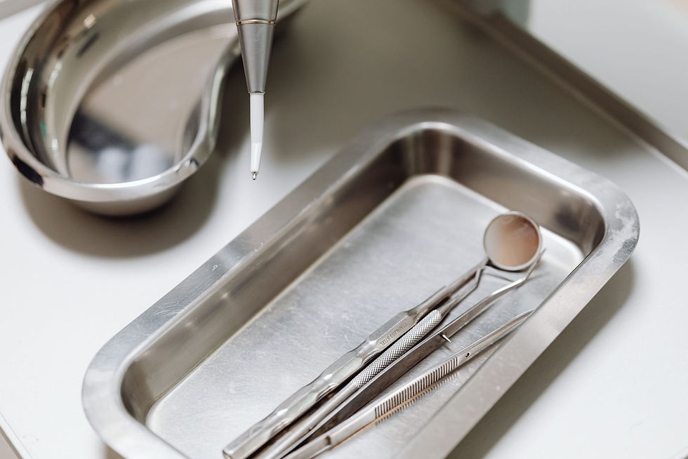 Dental instruments on a tray in a practice weighing common dental IT support questions