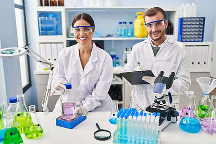 man-woman-scientist-partners-write-clipboard-measuring-liquid-working-laboratory.jpg