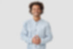 attractive-mixed-race-male-with-positive-smile-shows-white-teeth-keeps-hands-stomach-being