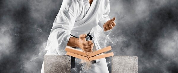 karate-master-breaks-wooden-board-600nw-2219220223.jpg
