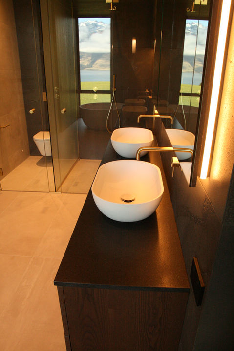 Custom double wall hung vanity for master ensuite with mirror cabinetry