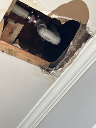 Drain Repair in the ceiling for a bathroom tub