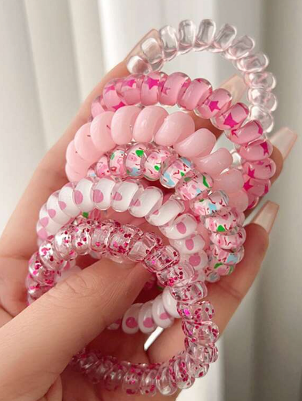 6 chouchous en plastique roses