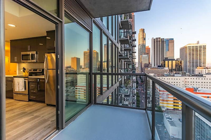 Clean apartment and balcony overlooking downtown area