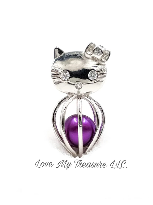hello kitty cage pendant