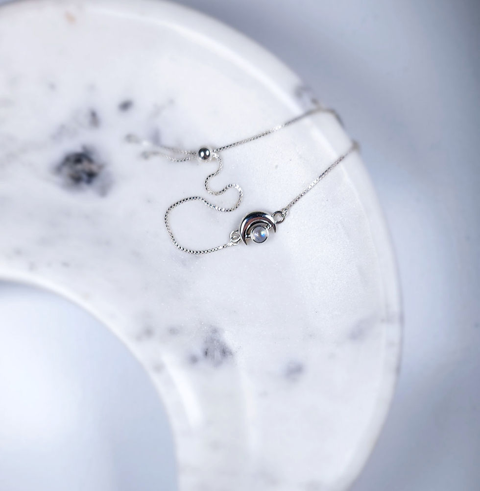 Thumbnail: Rainbow Moonstone Crescent Moon Bracelet in Sterling Silver