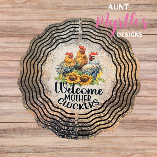 Rustic chicken wind spinner with three hens, sunflowers, and the playful phrase “Welcome Mother Cluckers.”