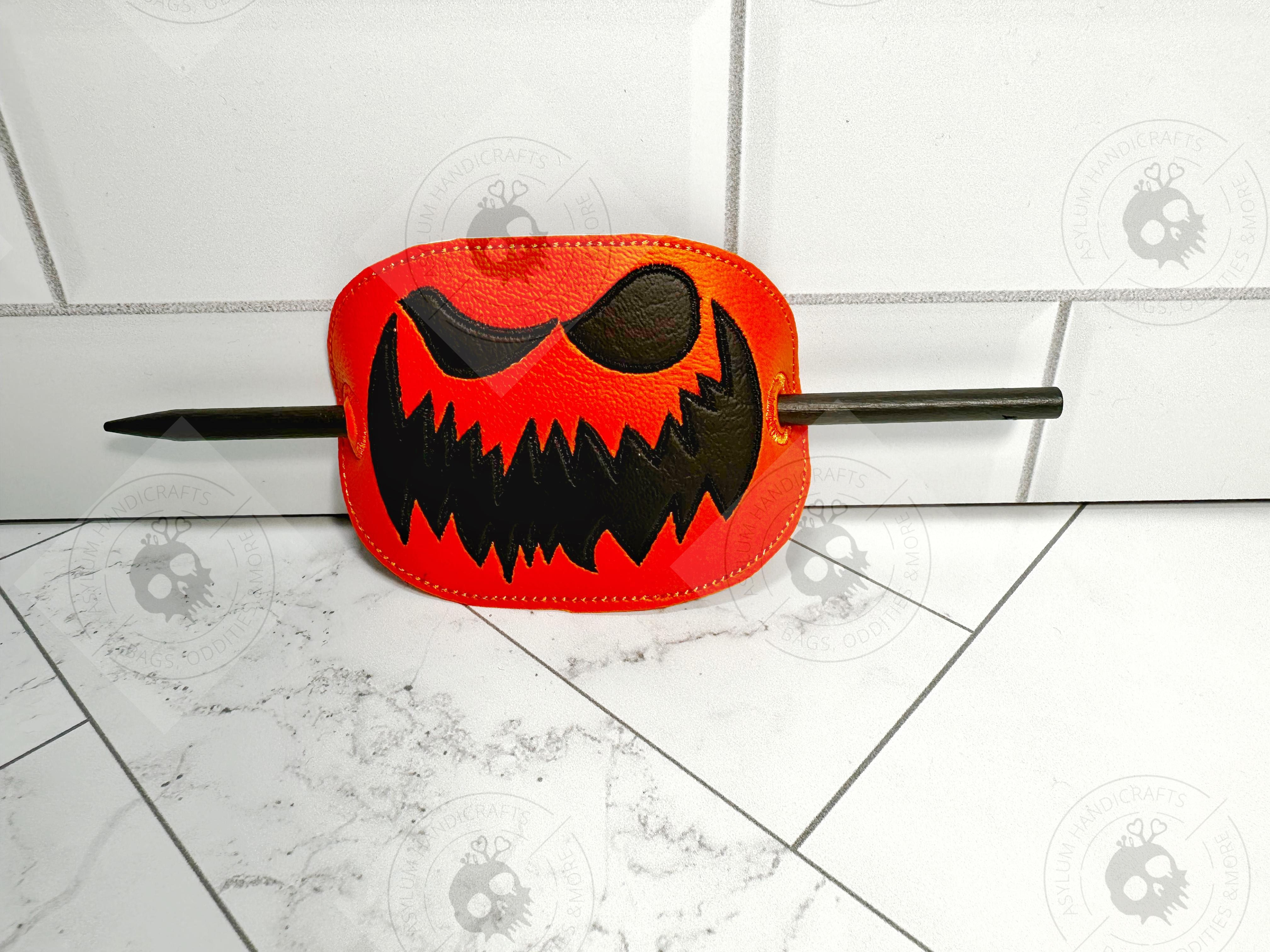 Scary Jack o lantern bun holder