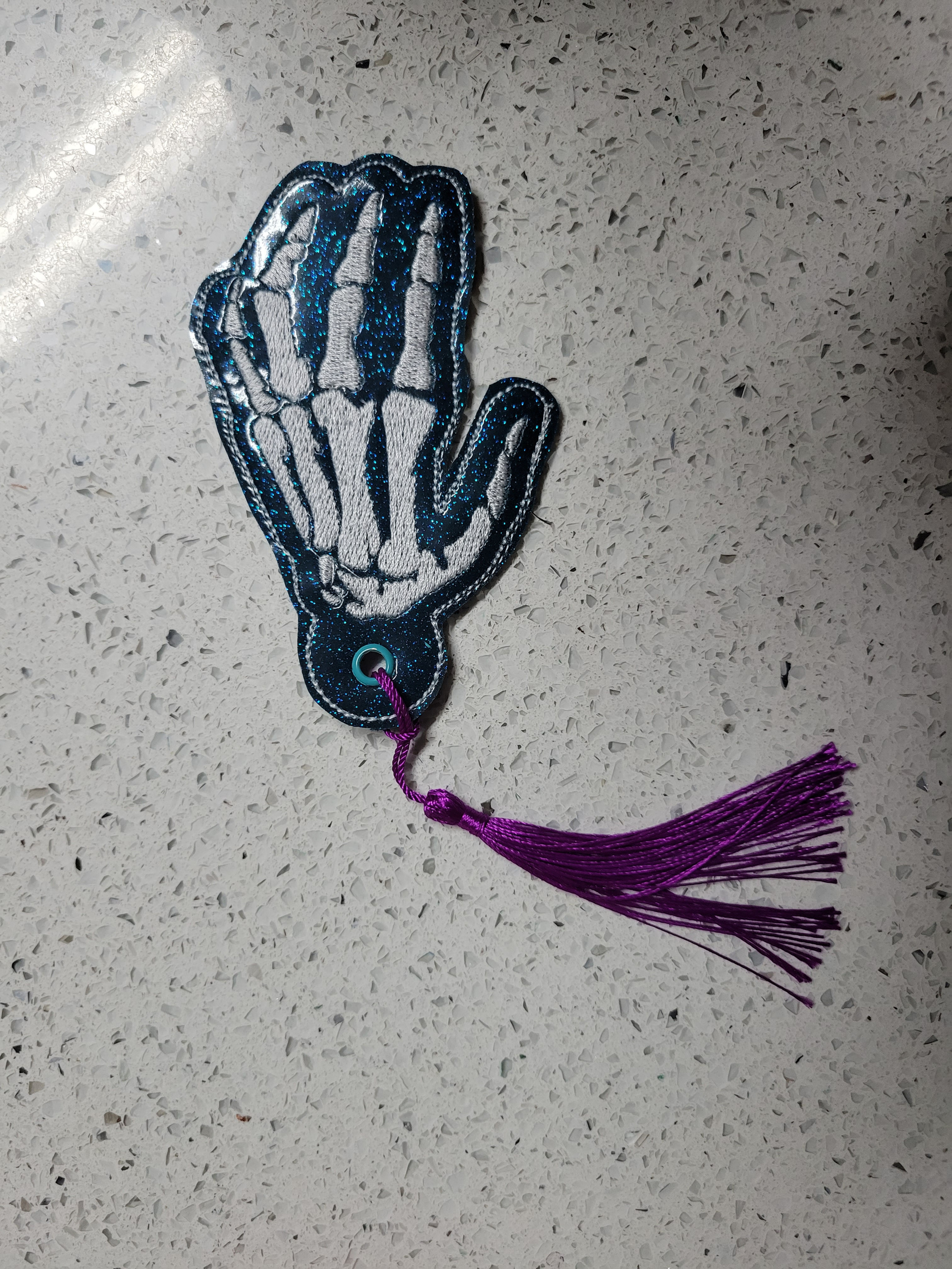 Skeleton hand bookmark/keychain