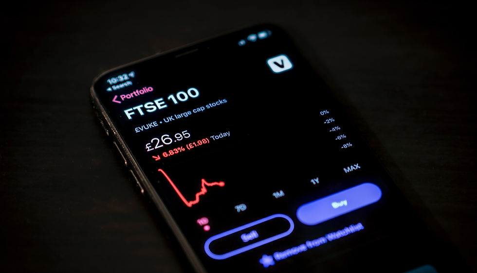 Un téléphone qui affiche les cours du FTSE100, l'indice boursier britannique
