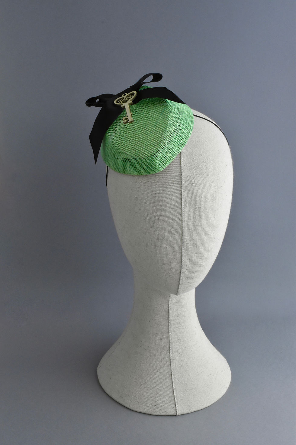 Thumbnail: Green Percher Hat with a Key