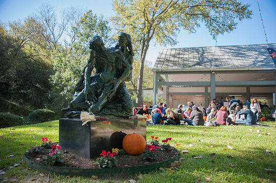 Visitors on upper lawn with Pieta.jpeg