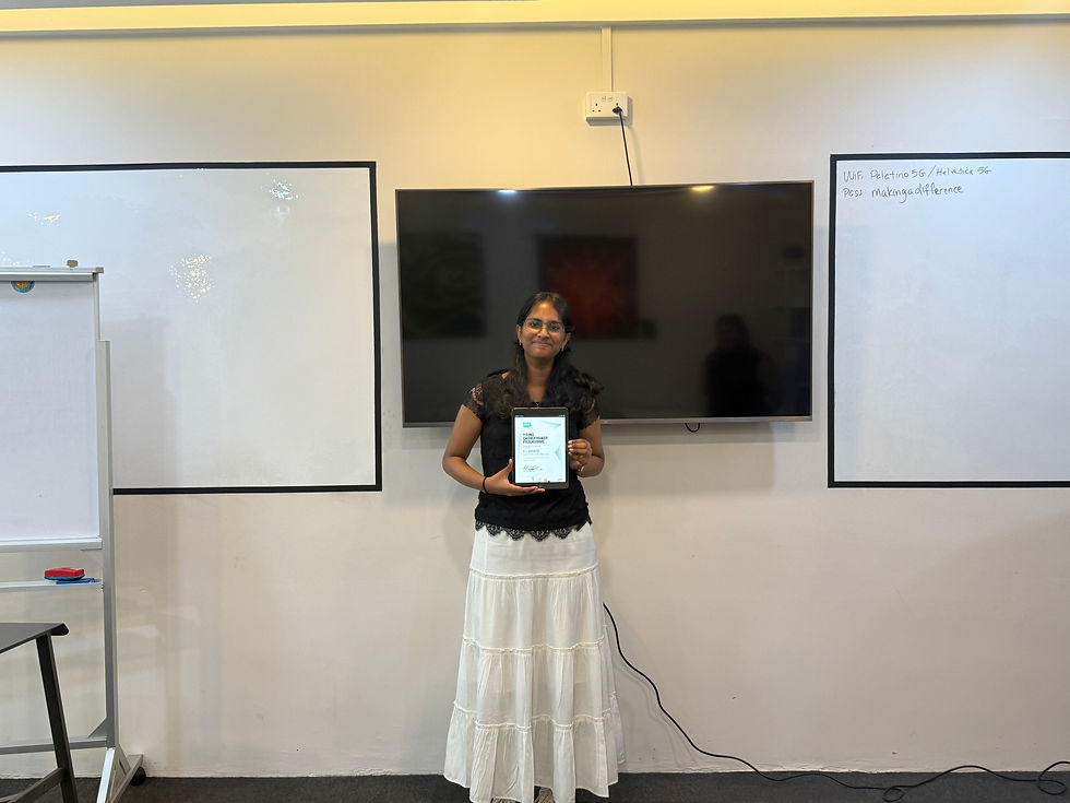 Advaita receiving her certificate of completion at the end of her internship at MTC.