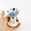 Thumbnail: Hanukkah doggy with menorah. 