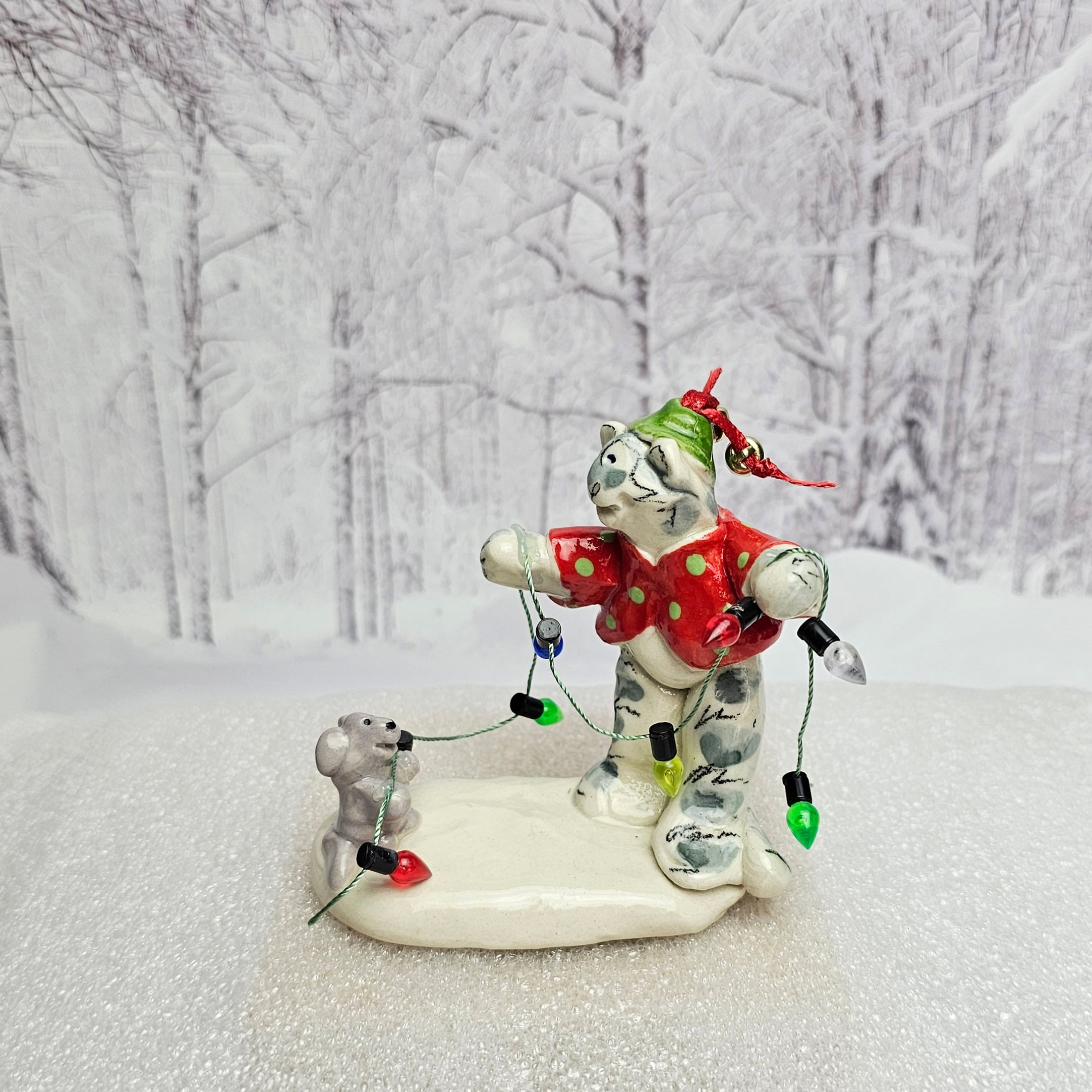 Kitty Elf and mousy get the lights ready. 