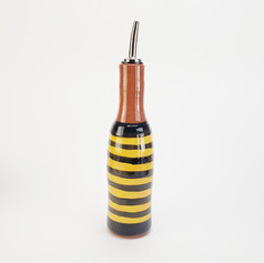 Yellow Confettin oil bottle