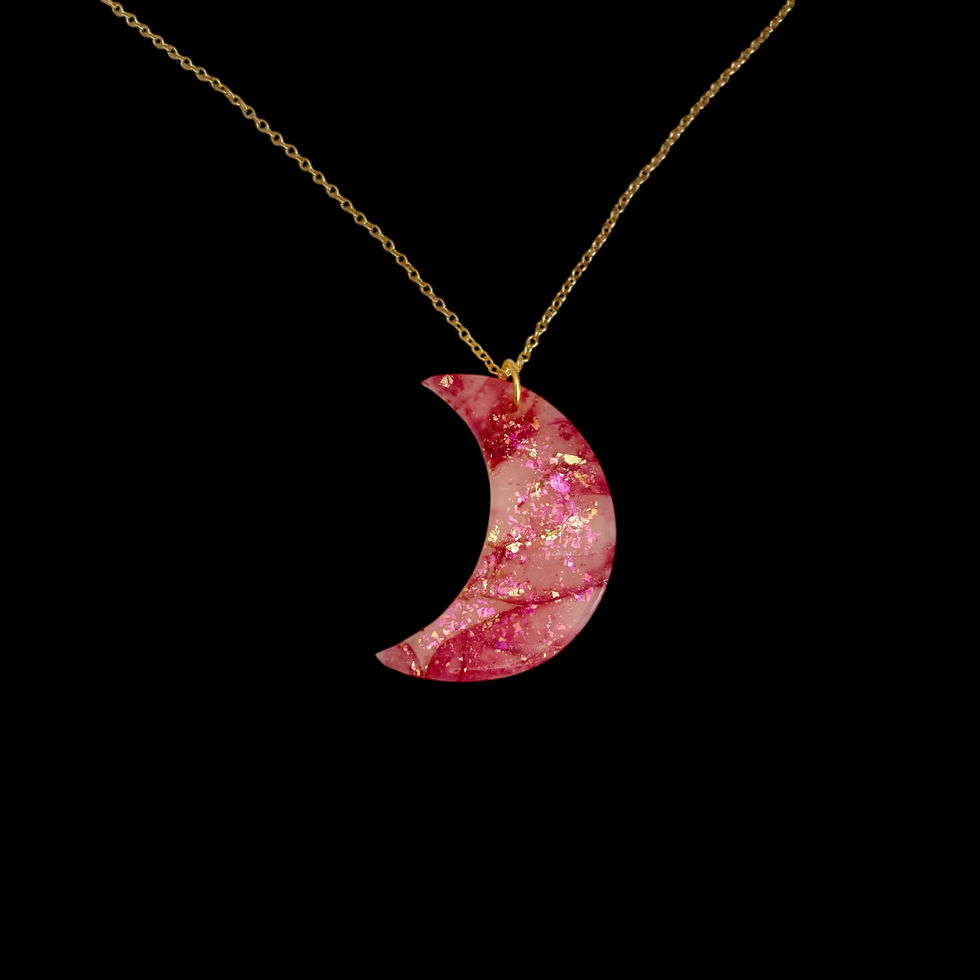 A moon necklace on a gold moon necklace chain for celestial style.