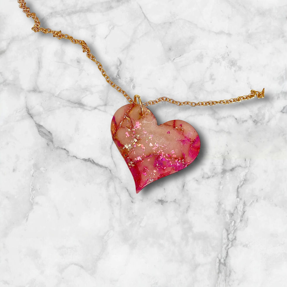 A heart necklace with a gold heart necklace chain for a romantic style.