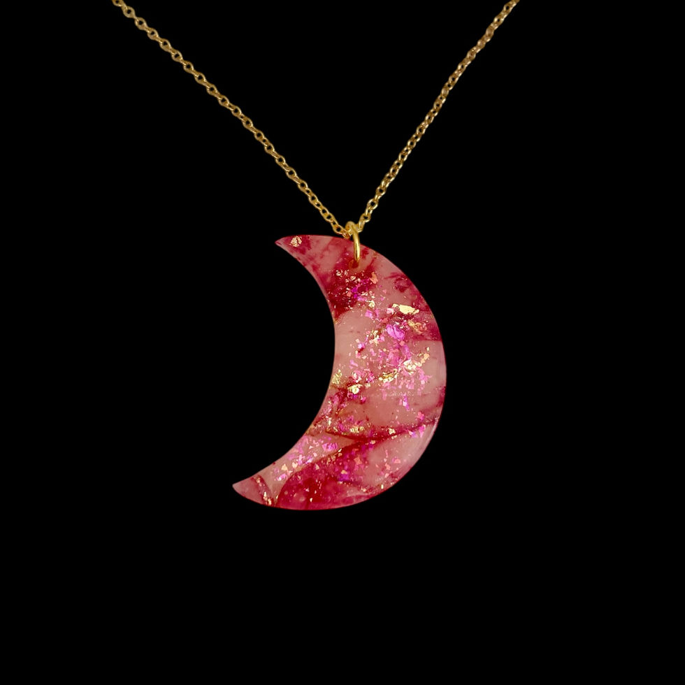 A moon necklace on a gold moon necklace chain for celestial style.